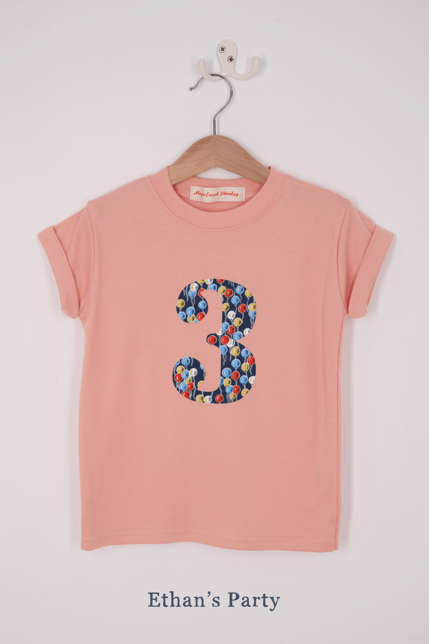 A pink birthday t-shirt with a number 3 on in Liberty balloon print.