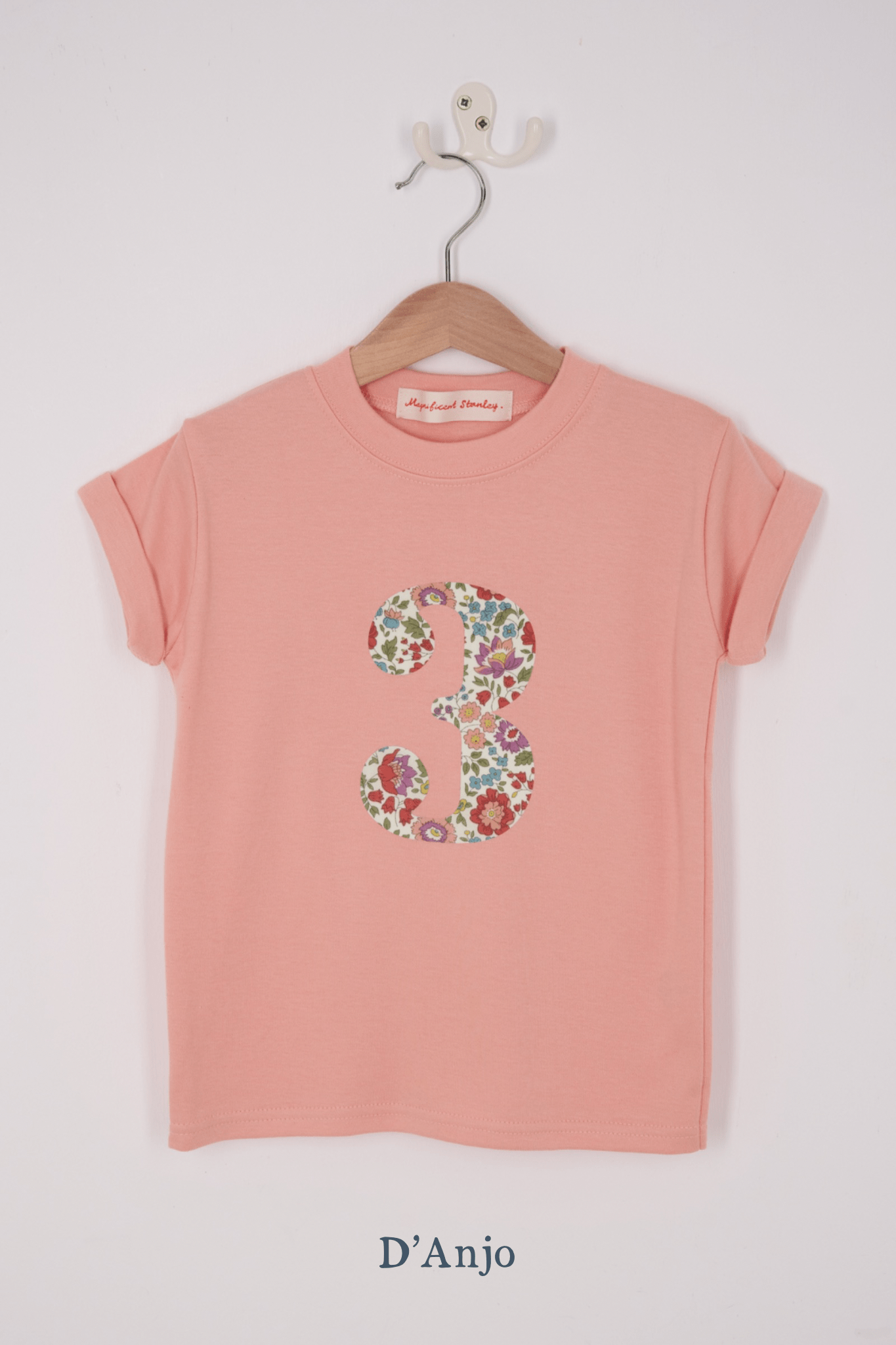 A pink birthday t-shirt with a number 3 on in Liberty floral print.