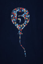 A navy t-shirt with a number 5 in a balloon on the front. The balloon is cut from Ethan's Party balloon Liberty print.