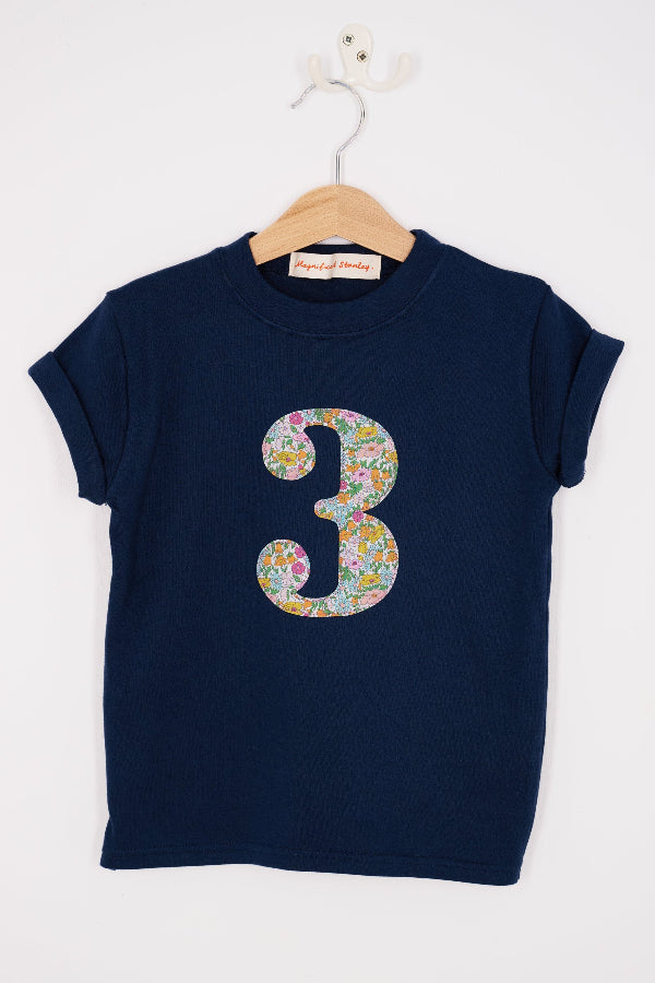 a Magnificent Stanley kids Number 3 Navy T-Shirt in Poppy Forest Liberty Print.