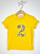 a birthday Number 2 Yellow cotton T-Shirt in Dinosaur Liberty Print.