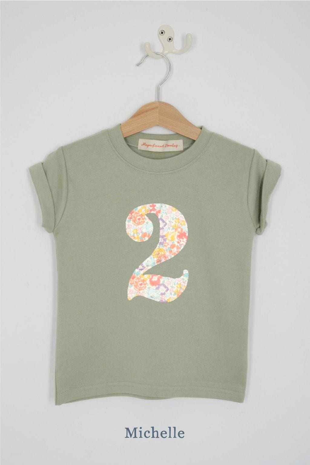 a number 2nd birthday kids sage green t-shirt with a number cut from Michelle  floral liberty print on the front.