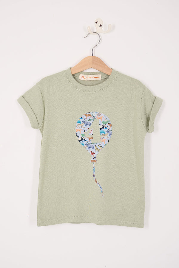 a sage green t-shirt with a colourful number balloon design made from animal liberty print 