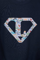 a personalised navy blue sweatshirt with an initial superhero logo on the front in Quey 2 animal liberty print