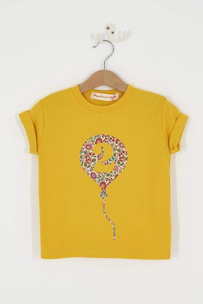 a Yellow T-Shirt with a Number 2 Balloon on the front made in floral Liberty Print